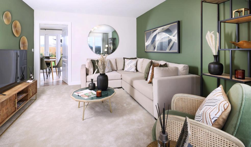 The Appleton show home at Cross Fields is styled in olive tones with golden accents and warm neutrals