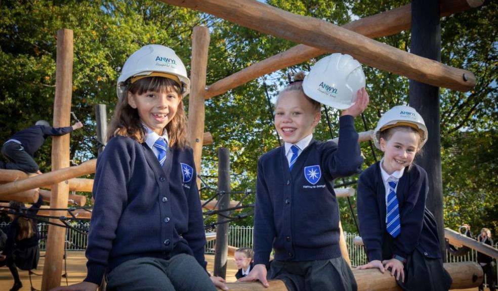 Children from Handforth Grange Primary School try out the new play area in Handforth