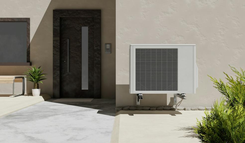 a house with a heater on the outside of it