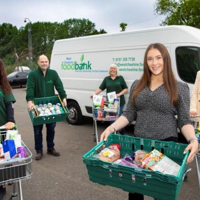Anwyl sales manager Sophie Jones with (LR) West Cheshire food bank volunteers Lydia Jan  Barry and operations coordinator Lindsay Burghall