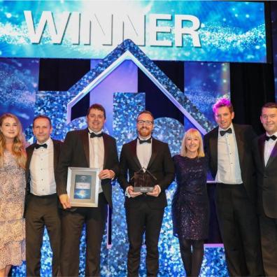 The Castle Green Homes team with Sir Lenny Henry at the Housebuilder Awards